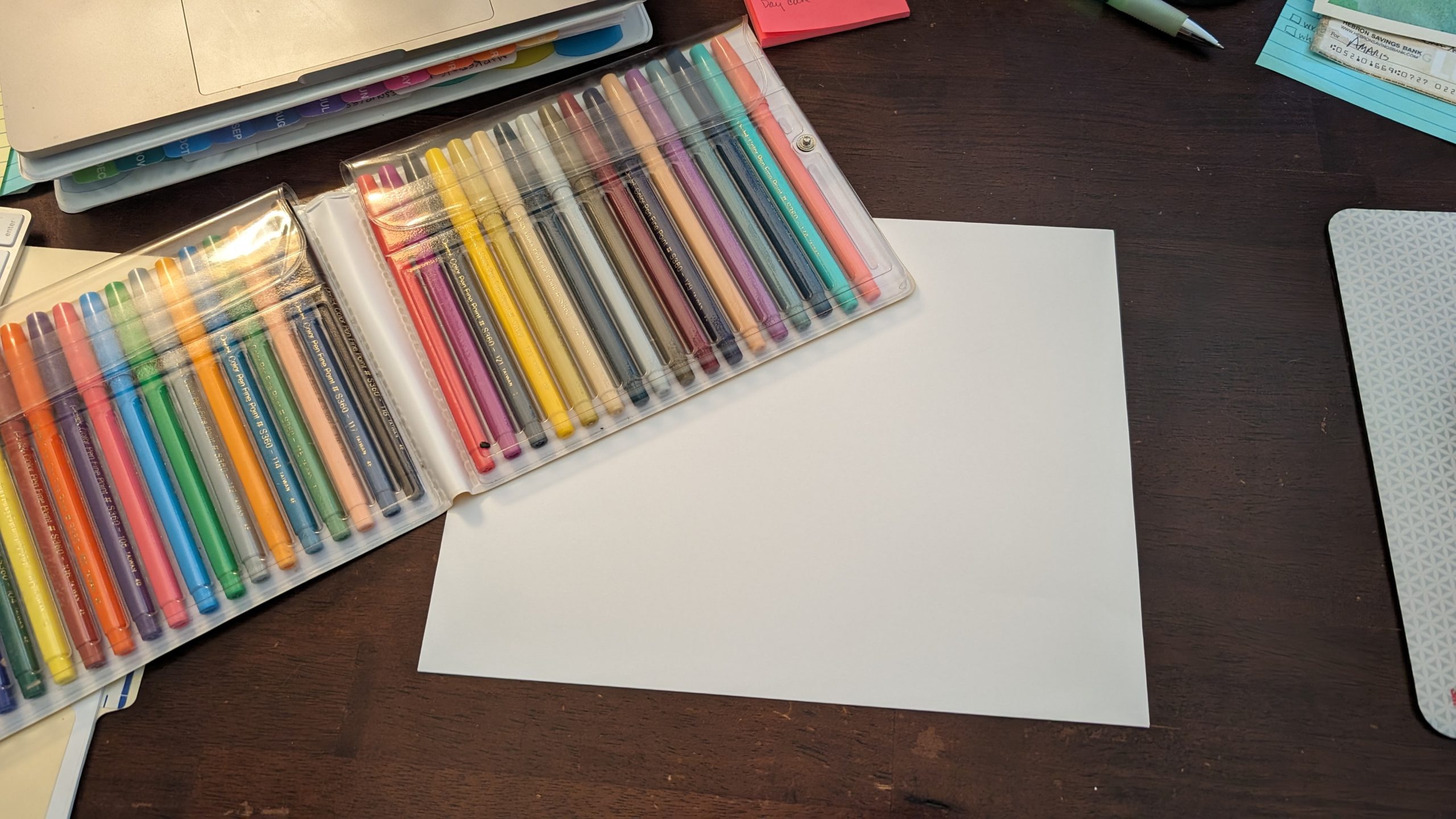 markers and paper on desk for mindful art exercise caregivers